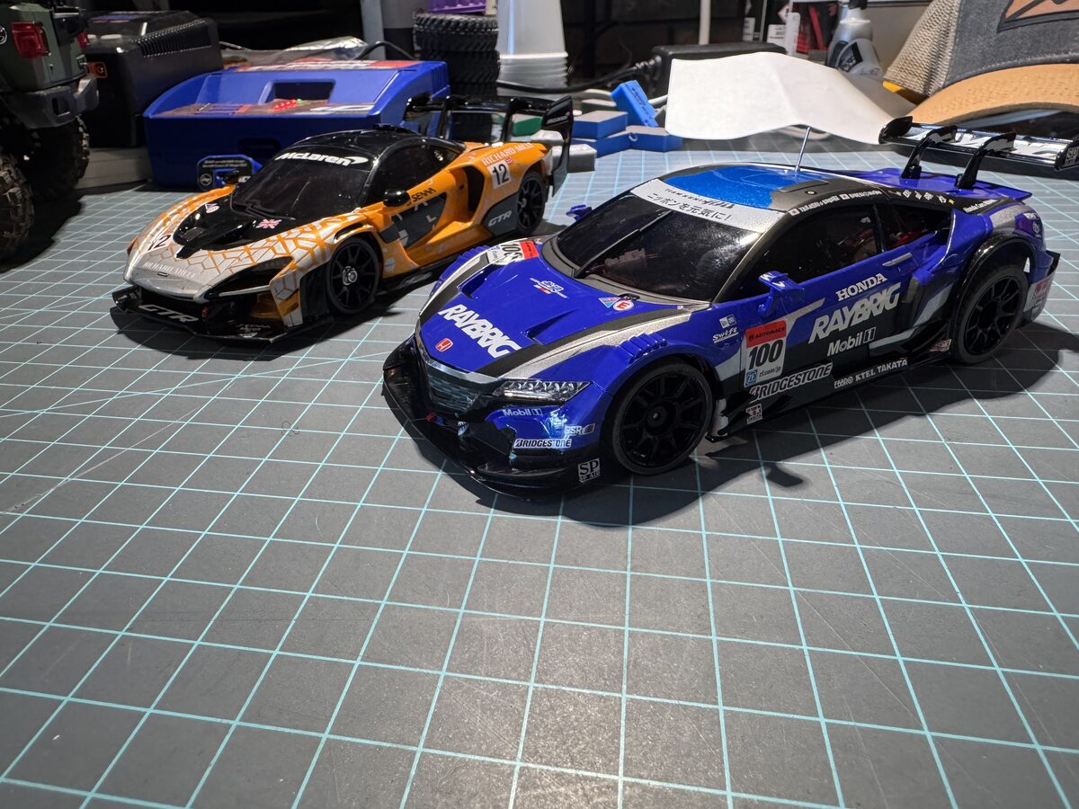Both cars on the cutting mat